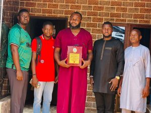 PRESS RELEASE:

 *STUDENTS UNION GOVERNMENT (SUG) OF PRINCE ABUBAKAR AUDU UNIVERSITY (PAUU), ANYIGBA, HONOURS OMALA LGA CHAIRMAN* 

The Students' Union Government (SUG) of Prince Abubakar Audu University (PAAU) eailer today, presented an award to Hon. Edibo, Peter Ameh Mark, The Executive Chairman of Omala Local Government Area, as the most charismatic LG chairman in Kogi East.

The award, presented during their visit, recognizes Hon. Edibo's outstanding leadership efforts at restoring peace to Bagana and the entire Omala North communities and Omala LGA.

The SUG President, Comrade Emmanuel Agbo Shaibu (Penlord) also commended Hon. Edibo for his kindness and charitable acts towards Omala LG students, urging him to continue his good works.

Hon. Edibo expressed gratitude for the award, applauding the students' initiative. He pledged to continue working tirelessly to ensure Omala LG remains safe and free from violence.

 "I'm deeply grateful for this award", Hon. Edibo said. "I shall continue striving hard to make sure Omala LG is safe and free from violence."

Signed
Usman Bashir,
Media Assistant on New Media and Communication to The Executive Chairman, Omala LGA.
