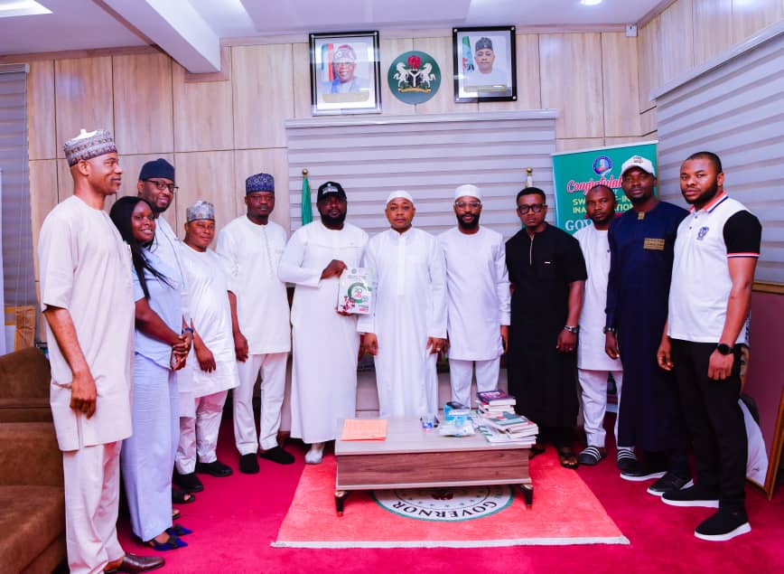 Ododo and Babangida in a group photograph 